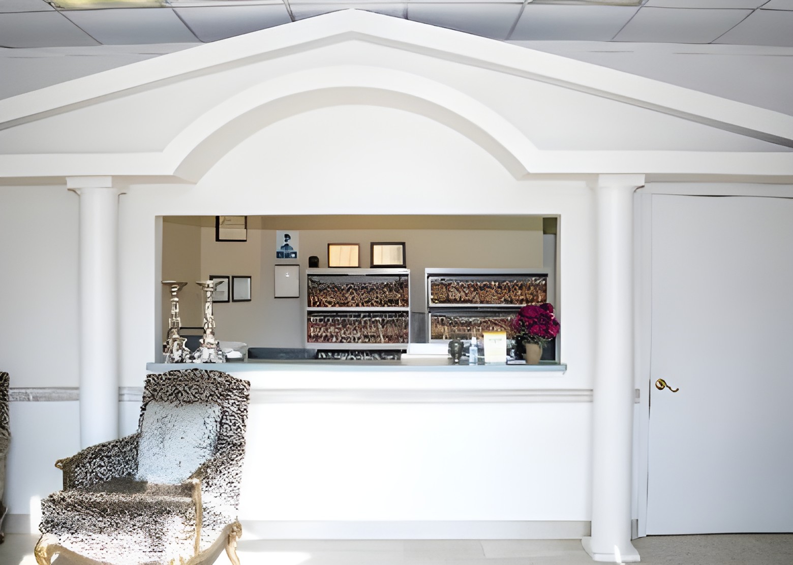 The reception desk and seating area at Brighten Dental in Sugar Land